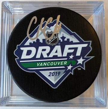 Cole Caulfield autographed draft puck