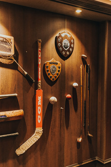 a display of various sports memorabilia on a wall