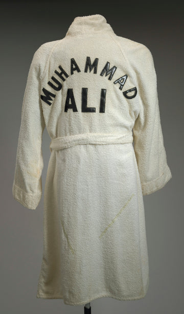 White robe with muhammad ali printed on back