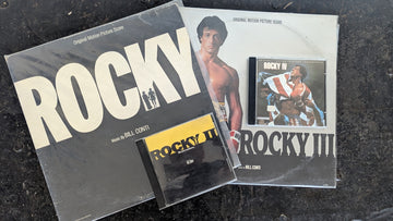 Rocky film soundtrack albums and cds displayed.