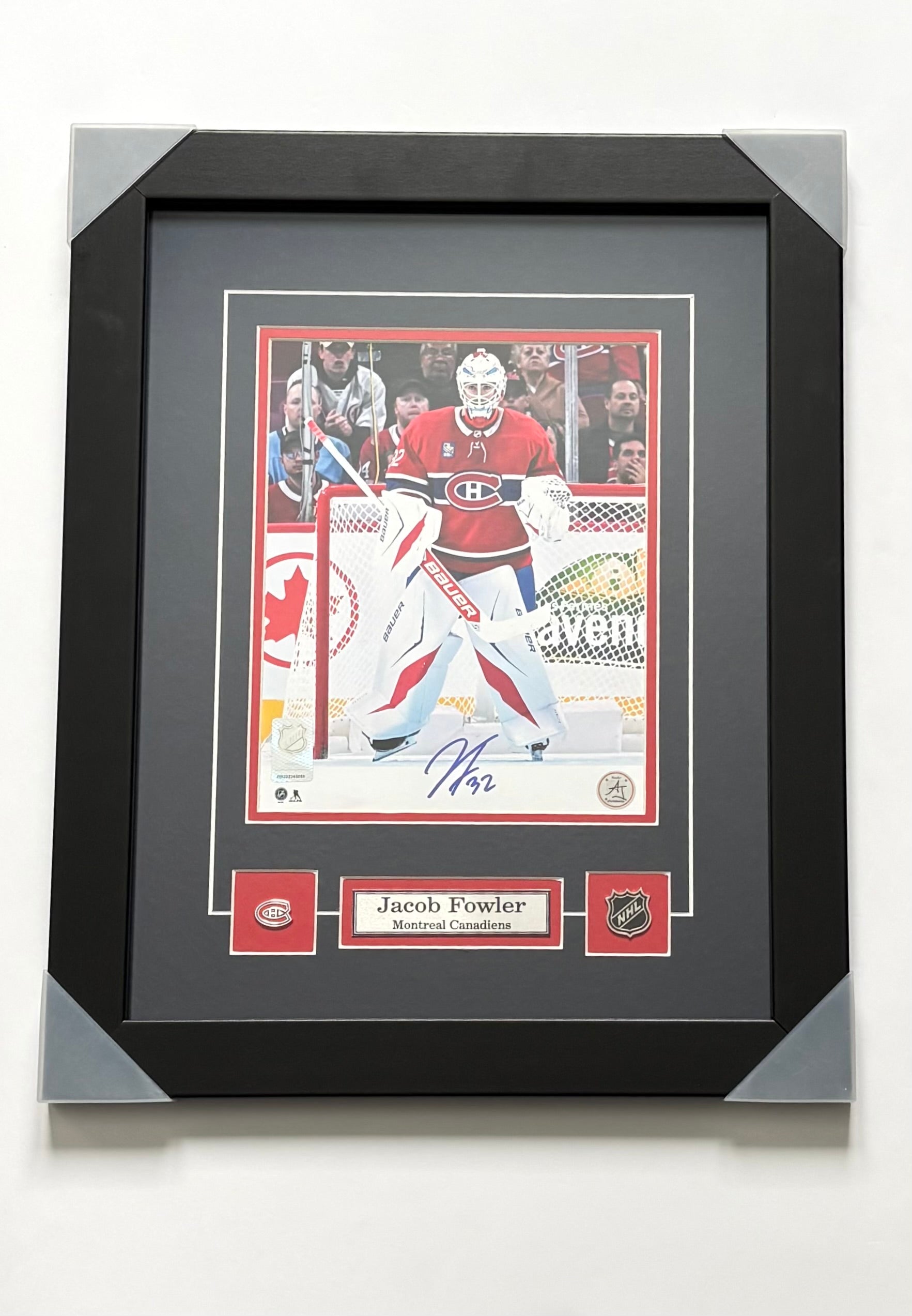 Jacob Fowler's authentic hand-signed memorabilia captures a piece of Montreal Canadiens history