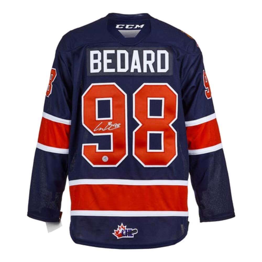 Connor Bedard Autographed Regina Pats Jersey in Blue. Back view, number 98. Accompanied with a Certificate of Authenticity.